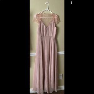 Blush floor length bridesmaid dresses.